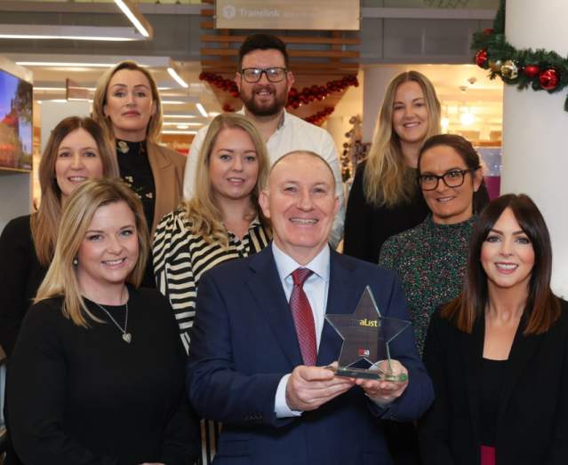 Photo of Visit Belfast team accepting an award.