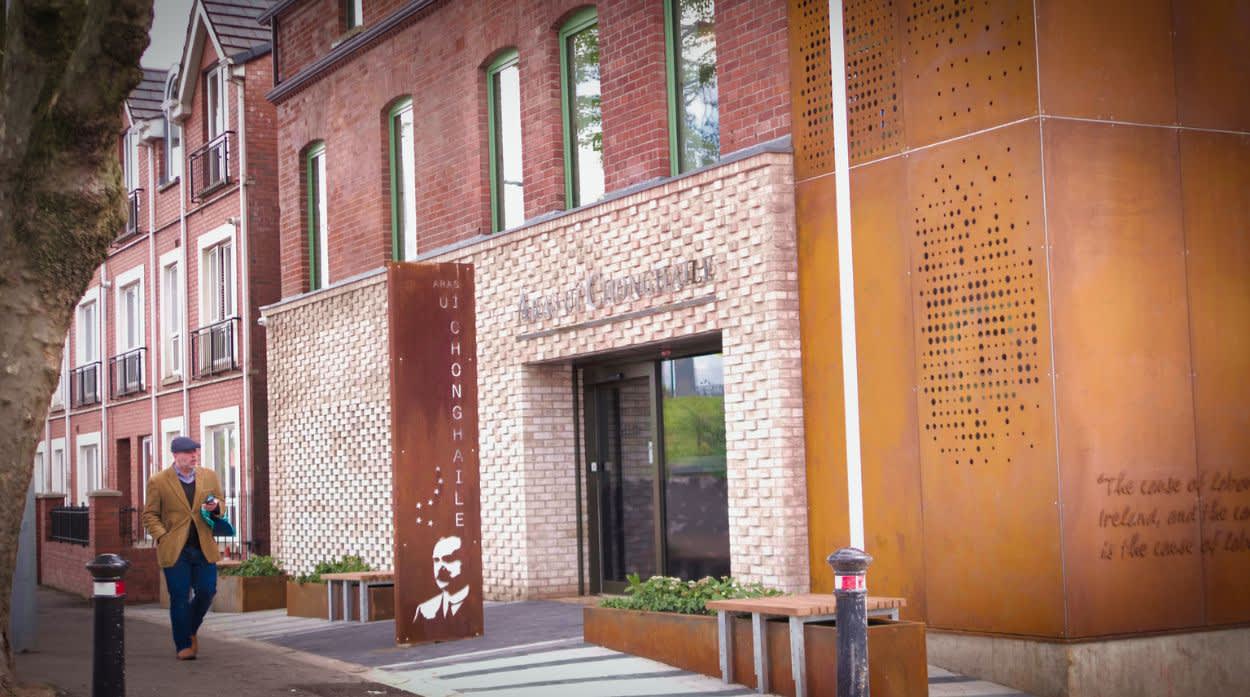 Man walking outside the James Connolly Visitor Centre.