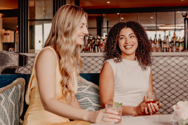 Grand Central Two Girls Enjoying Cocktails