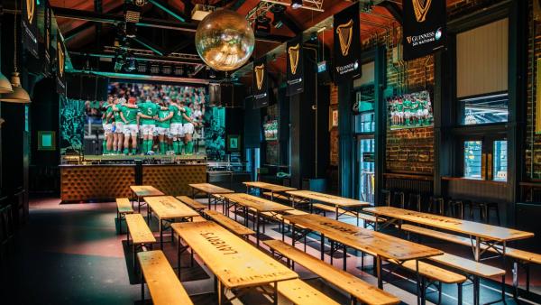 Lavery's Six Nations set up with tables and a tv showing the rugby.