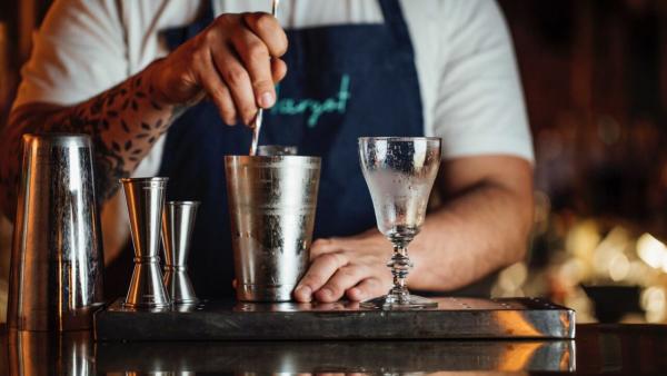 Man making a cocktail at Margot