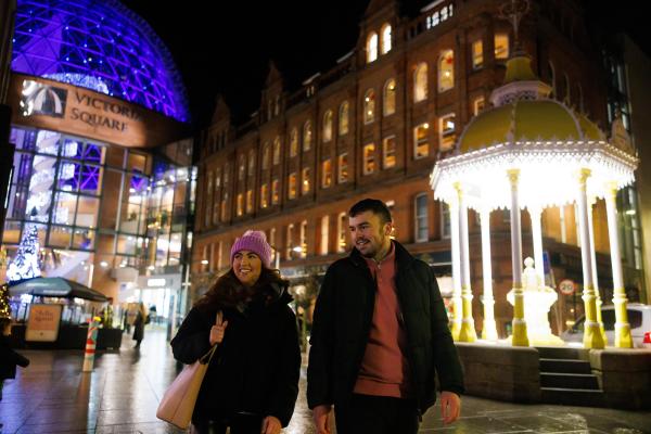 Young couple Christmas Shopping at Victoria Square