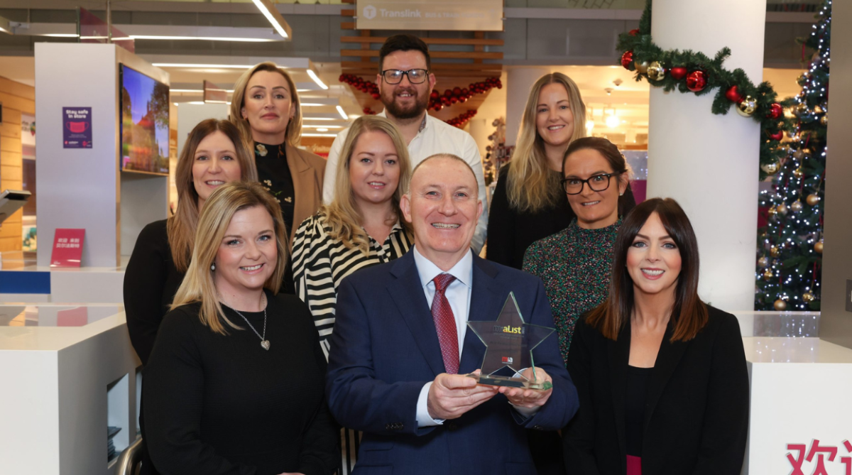 Photo of Visit Belfast team accepting an award.