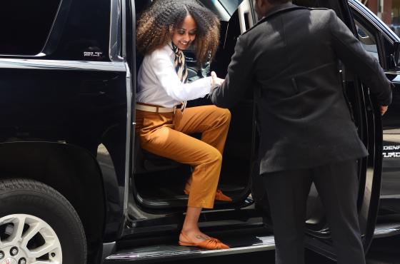 Elegant Arrival: Premium Chauffeur Service in Action