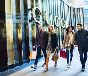 men women walking shopping