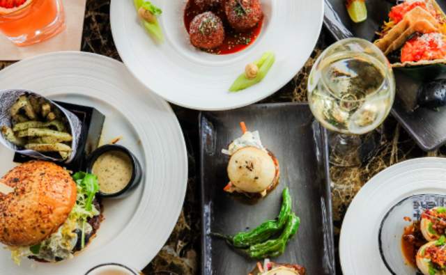 A variety of dining plates at Ascend Prime Steak & Sushi