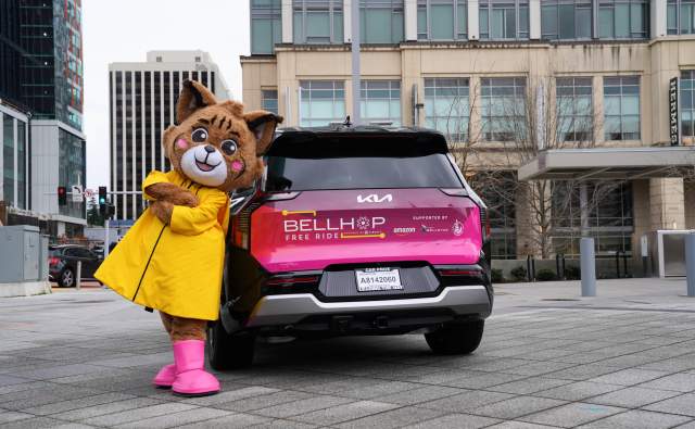 BellHop Kia vehicle with Belle the Bobcat