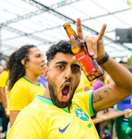 Man celebrating soccer match victory