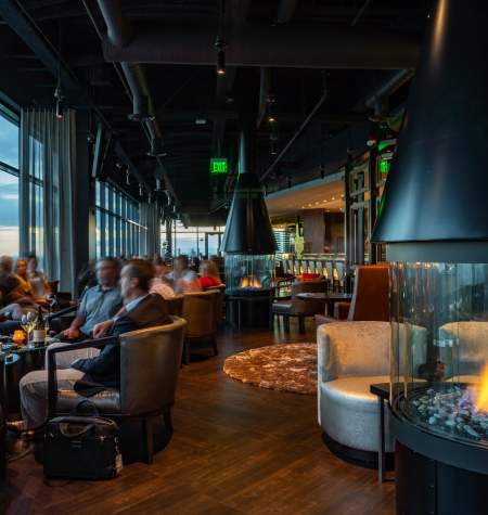 Ascend Steak and Sushi's cozy lounge with fire pit has expansive views