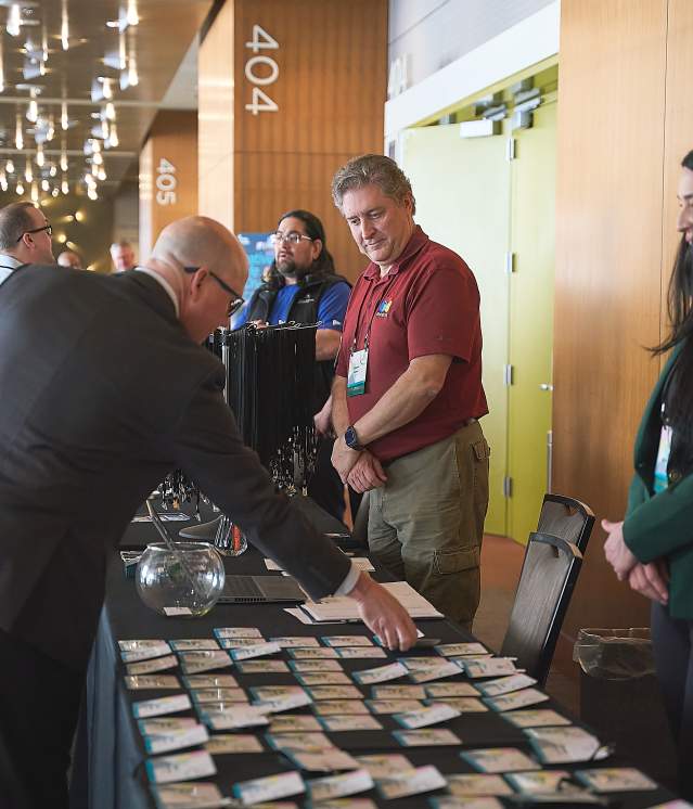Volunteers working event table