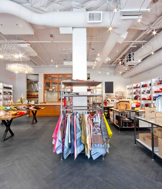 Whisk on Main Street is a bright and chic culinary boutique with hundreds of whisks hanging from the ceiling.