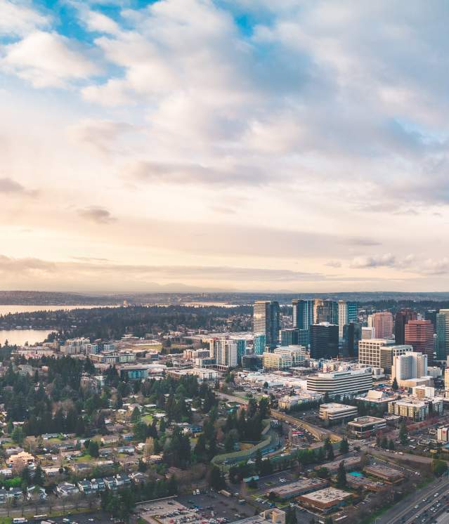 Aerial view of Kirkland, Washington overlooking downtown, Lake Washington, and surrounding neighborhoods.