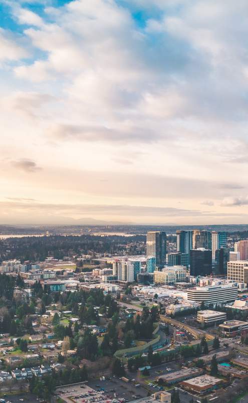 Aerial view of Kirkland, Washington overlooking downtown, Lake Washington, and surrounding neighborhoods.