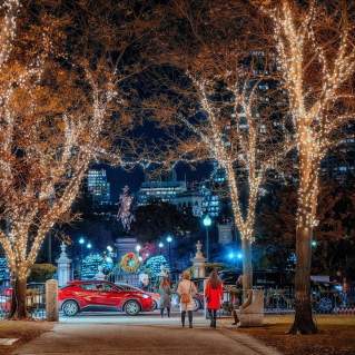 People on the Commonwealth Ave Mall walking the Holiday Lights Trail