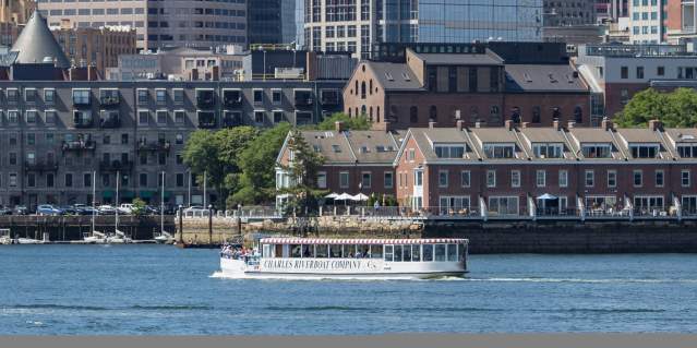 Charles Riverboat cruise in front of Custom House Tower