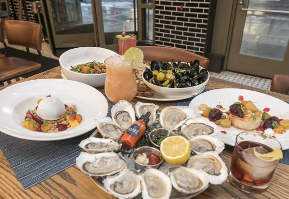 Seafood entrees and colorful desserts