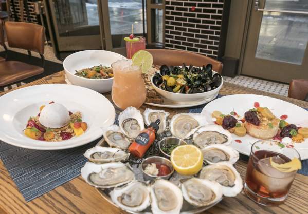 Seafood entrees and colorful desserts