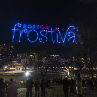 Drones displaying "Boston Frostival" during Meet Boston's Holiday Drone Shows on Boston Common