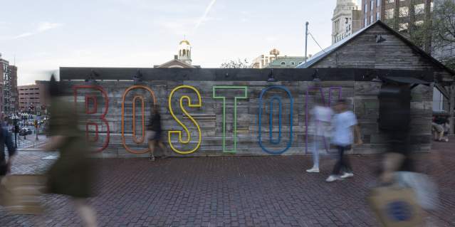 Boston sign over a wall outside City Hall Plaza