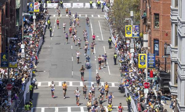 Boston marathon finishers on Hereford Street before turing onto Boylston Street