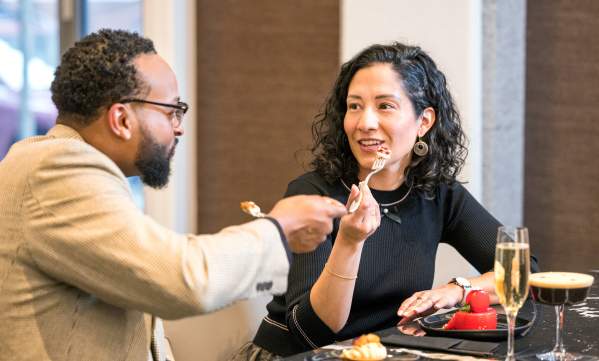 Two people dining at Trifecta