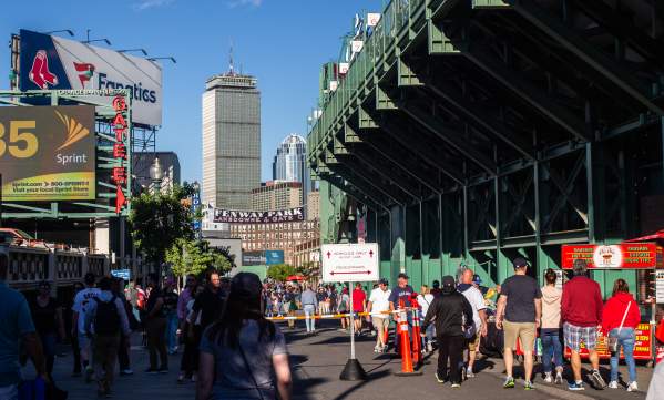 Crowds walking outside of Fenway Park