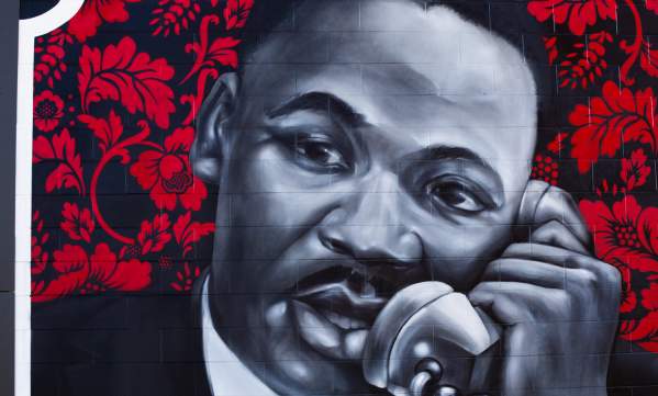 Close up of mural showing MLK talking on a phone