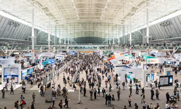 Large Meeting space with attendees at Boston Convention and Exhibition Center