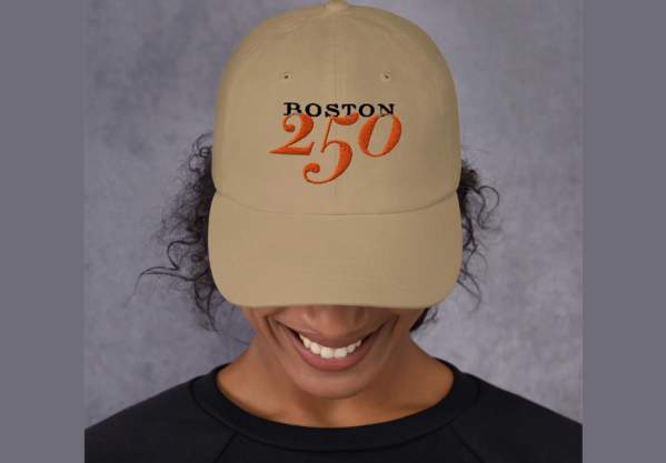 Model wearing a cap with the Boston 250 logo