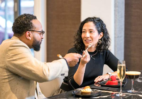 Two people dining at Trifecta