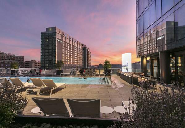 People swimming at the Omni Seaport