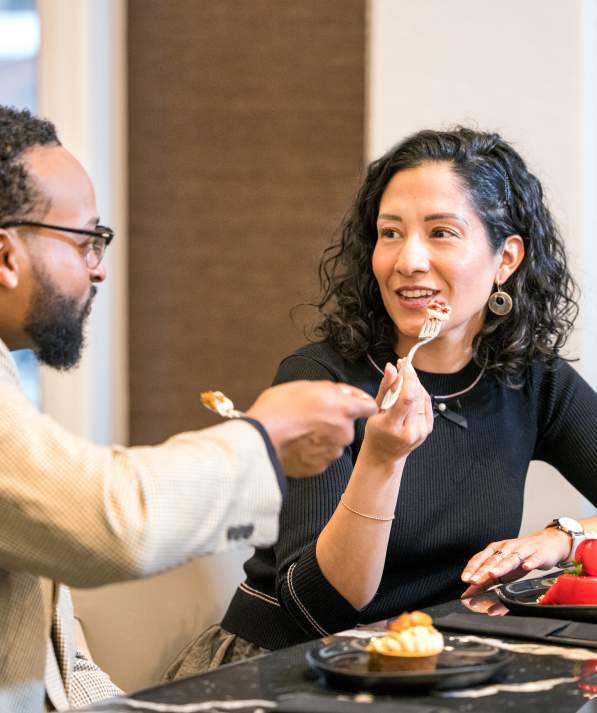 Two people dining at Trifecta