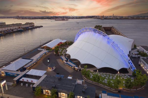 Aerial view of Leader Bank Pavilion at dusk.