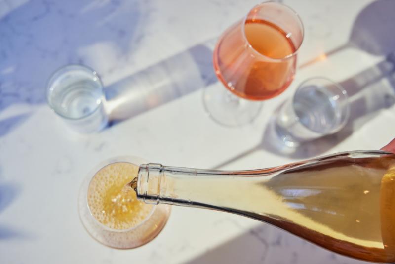 Wine being poured at Nathalie