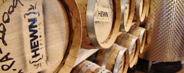 Each barrel of Hewn Spirits, from their Shipmate Gold Rum to the Red Barn Rye Whiskey is made from grains grown less than 10 miles from the distillery.