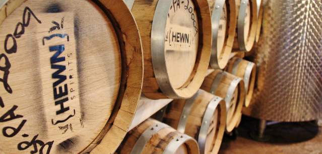 Each barrel of Hewn Spirits, from their Shipmate Gold Rum to the Red Barn Rye Whiskey is made from grains grown less than 10 miles from the distillery.