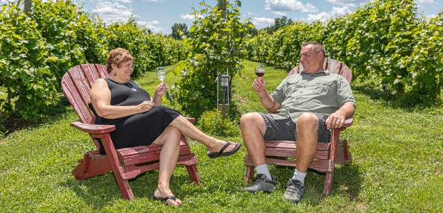 A Couple Enjoying Wine At Bishop Estate