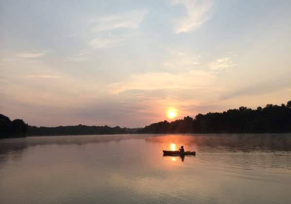 Enjoy a relaxing float on the water as the sun goes down at Core Creek Park.