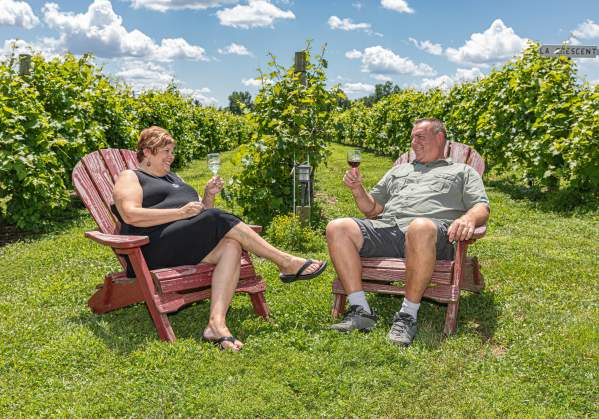 A Couple Enjoying Wine At Bishop Estate