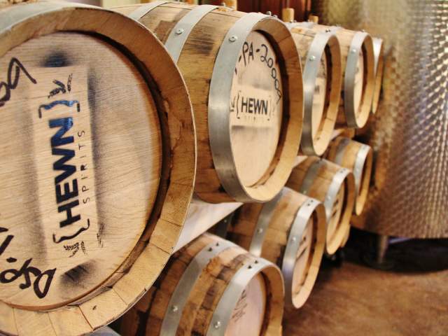 Each barrel of Hewn Spirits, from their Shipmate Gold Rum to the Red Barn Rye Whiskey is made from grains grown less than 10 miles from the distillery.