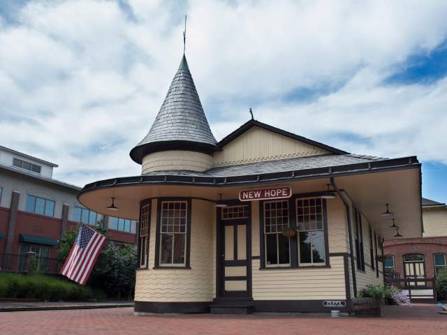 The New Hope Ivyland Railroad ticket booth is also known as the witch's hat because of it's shape and it's one of the most well-known sites in New Hope!
