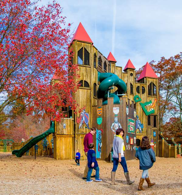 A family is ready to embark on an adventurous journey at the Kids Castle playground in Doylestown.