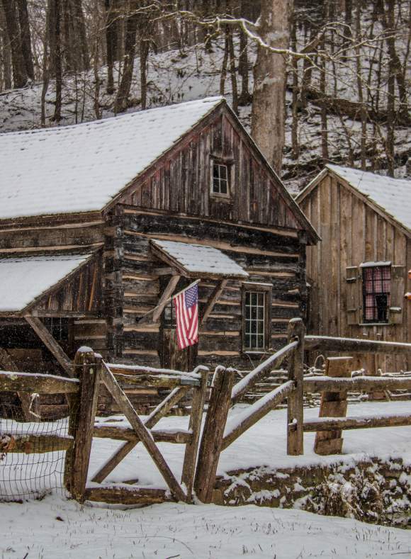 Log cabin in the snow