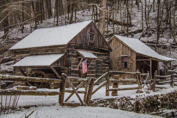 Log cabin in the snow