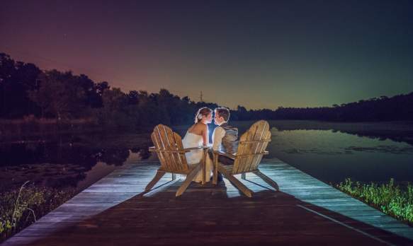 Newly husband and wife share a moment at The Lakehouse at Bulow.