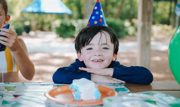Child celebrating a birthday at a waterpark rental.