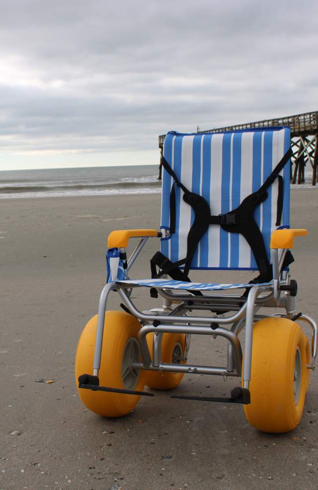 Beach wheelchair on the sand