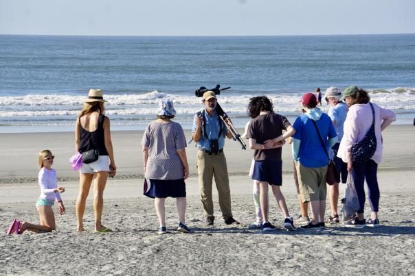 People at a nature program on the beach