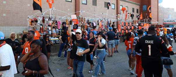 A group of Bengals fans tailgate before a game.