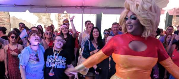 Drag Queen Sarah Jessica Darker dancing in front of NKY Pride crowd at Hotel Covington